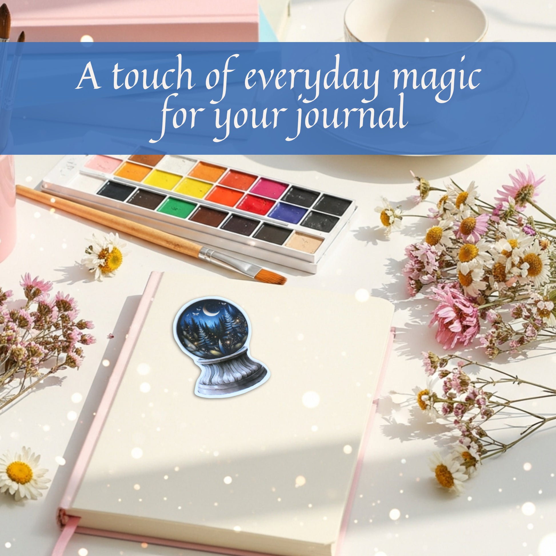 Witchcore fantasy sticker with crescent moon and glowing trees on open journal spread