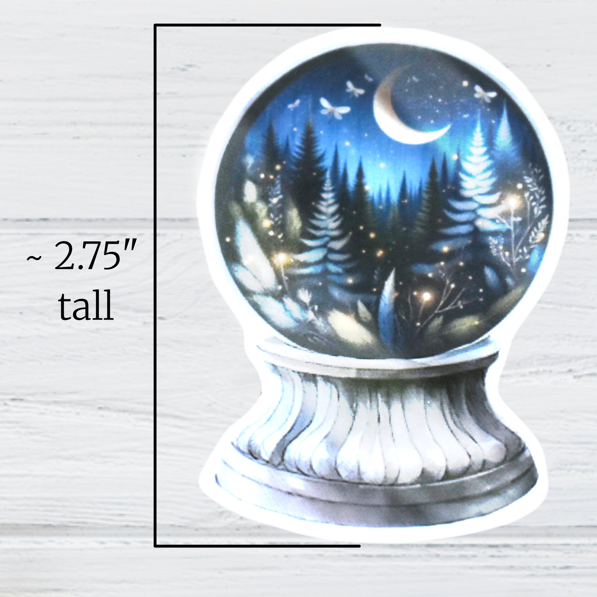 Close-up of fantasy evergreen forest scene inside crystal ball