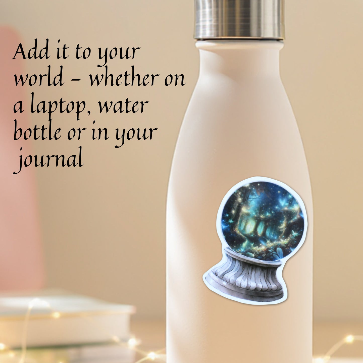 White water bottle with a decorative fantasy vinyl sticker showing fairy lights dancing beneath trees on a beige background