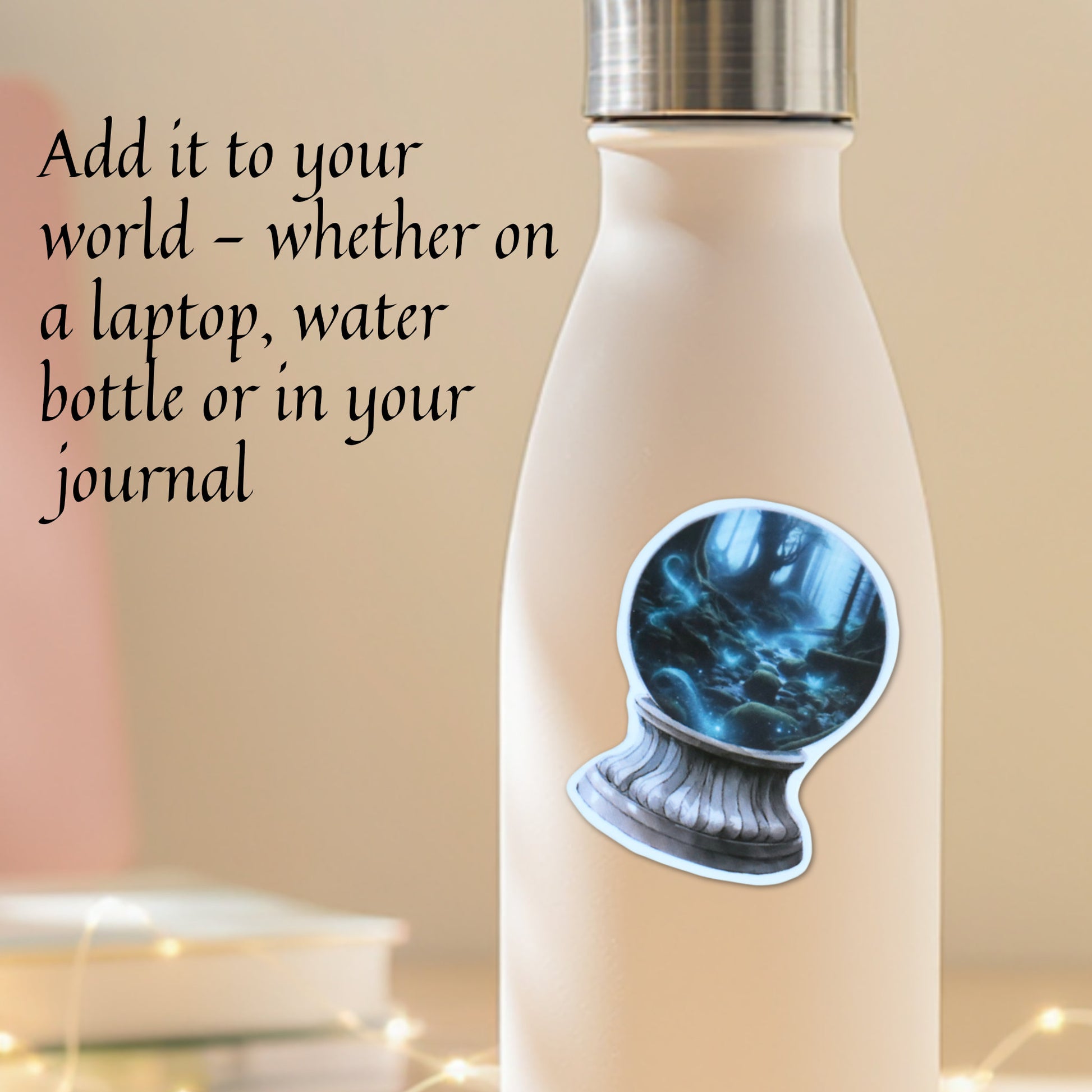 Beige water bottle with a decorative crystal ball sticker showing moonlit water flowing through trees on a blurred background